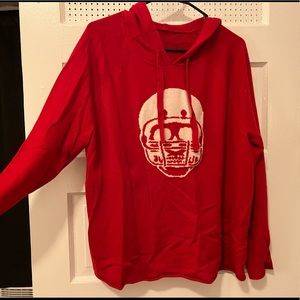 Cashmere red hooded sweater with skull wearing sports helmet print